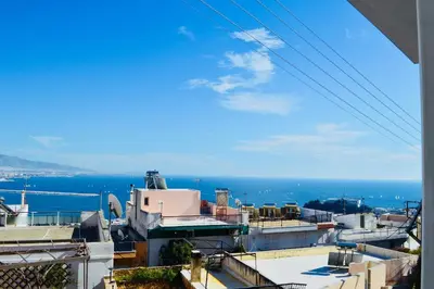 a view of the ocean from a building at Perfect View in Piraeus