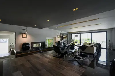 a living room with a couch and a table at Luxury Beachfront Villa Selenia Platinum in Sounio in Sounio