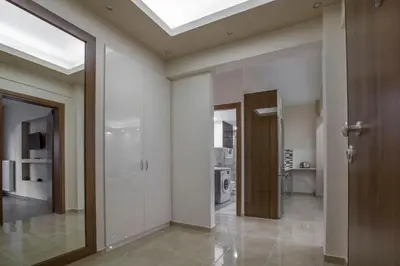 a hallway with a skylight in a house at Spacious & convenient place near Acropolis Museum by GHH in Athens