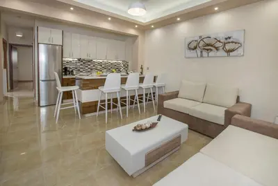 a living room with a couch and a table at Spacious & convenient place near Acropolis Museum by GHH in Athens