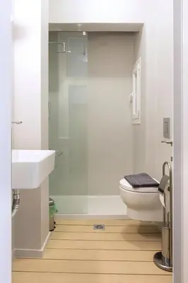 a bathroom with a toilet and a sink and a shower at luxury kolonaki studio in Athens