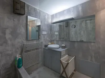 a bathroom with a sink and a toilet and a mirror at Live at the Acropolis shadow - under super scenic Anafiotika in Athens
