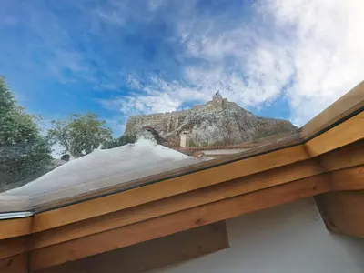 a roof with snow on top of it at Live at the Acropolis shadow - under super scenic Anafiotika in Athens