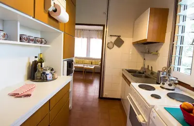 a kitchen with a sink and a counter top at THE BOUCAMVIGLIA BEACH HOUSE in Saronida