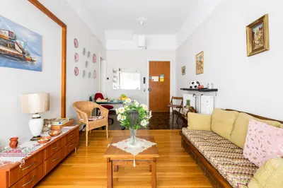 a living room with a couch and a table at Beautiful appartment under Akropolis! in Athens
