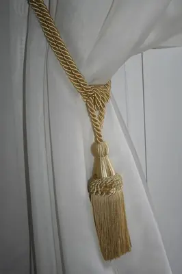 a yellow rope is tied to a white shirt at Athens Apartment in Athens