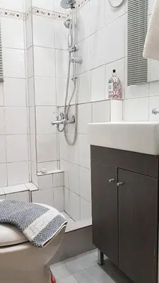 a bathroom with a shower and a sink and a toilet at Palette Apartment Bamboo - Athens Center, 6 BD, 3 BATH in Athens