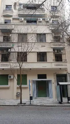 a building on the side of a city street at Palette Apartment Chocolate - Athens Center, 6 BD, 3 BATH in Athens