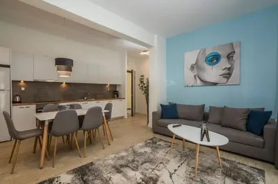 a living room with a couch and a table at Morum Athens Urban Stay in Athens