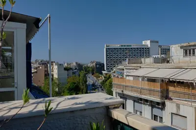 a view of a city from a balcony at Homz AH03 Penthouse Studio Hilton Area in Athens