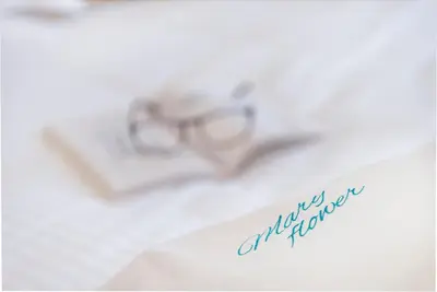 a piece of paper with a wedding ring on it at Maryflower Premium Apartments Piraeus in Piraeus