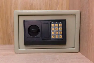 a small microwave oven sitting on top of a table at Lianos Apartments Business Class A in Piraeus