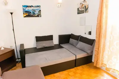 a small room with a couch in a room at Lianos Apartments Business Class A in Piraeus
