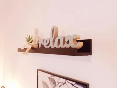 a wooden shelf with a hello sign on a wall at Athens city center cozy apartment in Athens