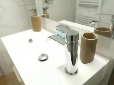 a bathroom with a sink with a faucet at Athens city center cozy apartment in Athens