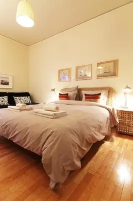 a bedroom with a large bed in a room at Dream Penthouse in Athens - Kolonaki in Athens