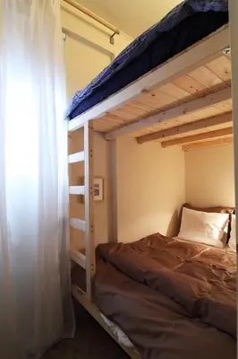 a bedroom with a bunk bed in a room at Dream Penthouse in Athens - Kolonaki in Athens