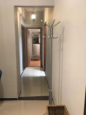 a hallway with a refrigerator in a room at Joges 2 in Athens