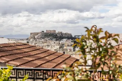 a view of the acropolis from the roofs of buildings at Oniro City in Athens