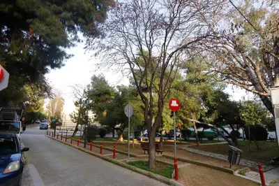 a street with a stop sign on the side of the road at INSPIRATION Guestroom with Amazing Roof Garden in Athens