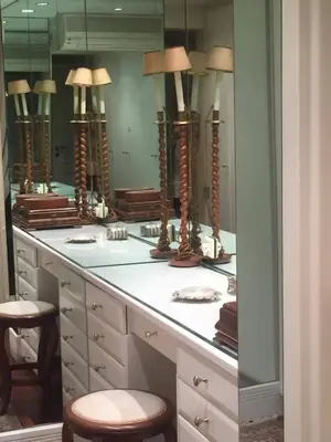 a bathroom with a vanity with a large mirror at Luxury Penthouse with Private Roof Swimming Pool in Athens