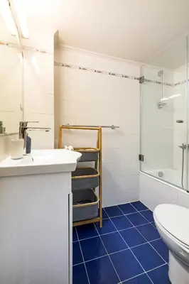 a bathroom with a sink and a toilet at 1 KM from The Acropolis 1 Bedroom Apt in Athens