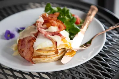 a plate of food with a sandwich and a salad at 14 Reasons Why Hotel Athens in Athens