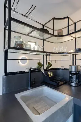 a kitchen with a sink and a counter top at Athenian Lofts in Athens