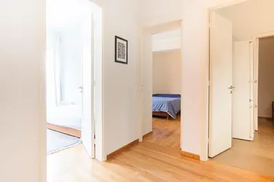 an empty room with a bedroom and a bed at Ermou 44 - 3bdr Apartment in Athens