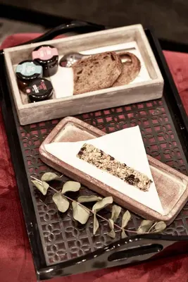 a tray with a slice of bread and a plate of food at Athens4 in Athens