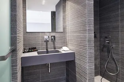 a bathroom with a sink and a shower at Athens4 in Athens
