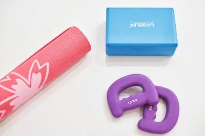 a pair of purple scissors next to a blue box at Luxury n Chic Athens Museum Apt in Athens