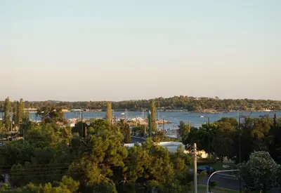 a view of a body of water with trees at Azur Suites in Athens