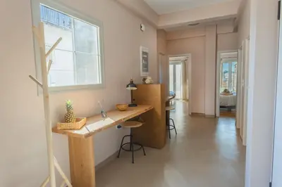 a home office with a desk and a window at 100m2 Luxury Apartment in the Heart of Athens - Living Stone Emerald in Athens