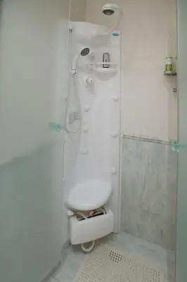 a bathroom with a shower with a toilet and a shower at Exceptional Villa in Voula near the sea in Athens