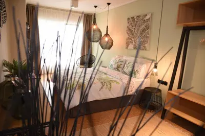 a bedroom with a bed and a window at CasaGreek Monastiraki - Athens in Athens