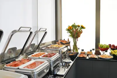 a buffet line with many different types of food at Athenaeum Smart Hotel in Athens