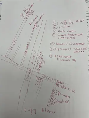 a whiteboard with a drawing of a street at Metro Fix Cosy Apartment in Athens
