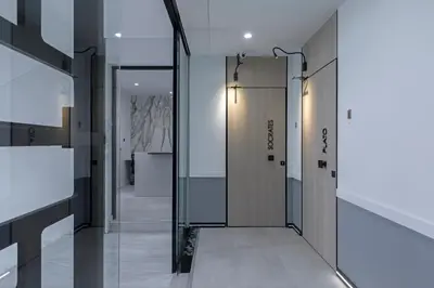 a hallway with two elevators in a building at Philosofia Athens Suites in Athens