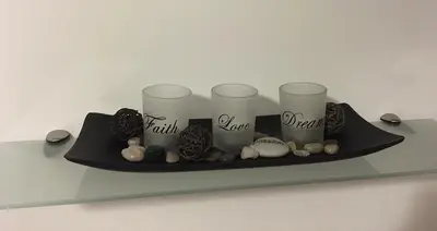 a shelf with three cups and balls on it at Sunny Elegant Studio in Athens