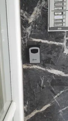 a toaster is sitting on the floor next to a door at Acropolis within 10min. walk! in Athens