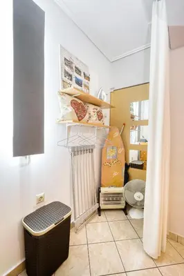 a room with a bed and a toilet in it at Athens metro apartment in Athens