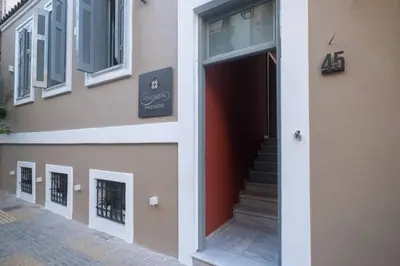 a entrance to a building with a stairway at ATHENIAN YARD SUITES in Athens
