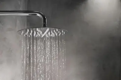 a shower with water dripping from a shower head at La Maison Athenes in Athens