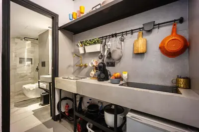a kitchen with a sink and a counter top at Well Designed 1BR in Prime Kolonaki in Athens