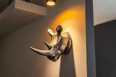 a nautical object is hanging on a wall at Well Designed 1BR in Prime Kolonaki in Athens