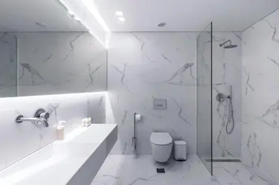 a white bathroom with a shower and a toilet at Heritage Boutique Apartments in Athens