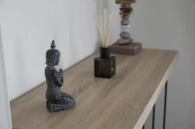 a black statue sitting on top of a table at Breathtaking view penthouse at the heart of Thiseio, VP homes in Athens