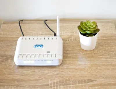 a scale sitting on a table next to a plant at Charming Apartment near Athens Center and the Sea in Athens