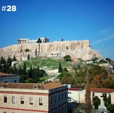 a view of the acropolis of athens from a city at Koukaki-close to Acropolis(Stone apartment) in Athens